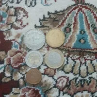 تعدادی سکه و اسکناس قدیمی ایرانی و خارجی