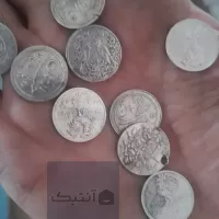 تعداد ۱۱ عدد سکه شاباش با تاریخ از ۱۳۳۴ تا ۱۳۳۹