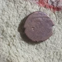 سکه فلوس قدیمی با تصویر حیوان