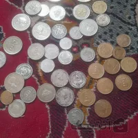 مقداری سکه و مدال دوره های مختلف